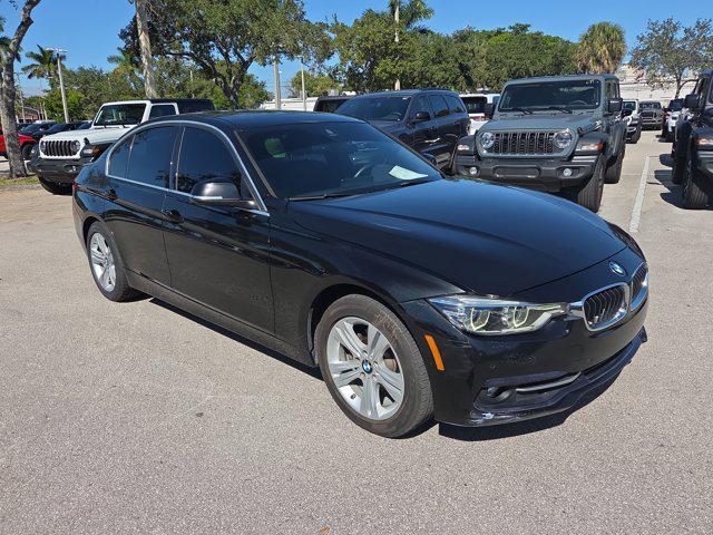 used 2018 BMW 330 car, priced at $12,033