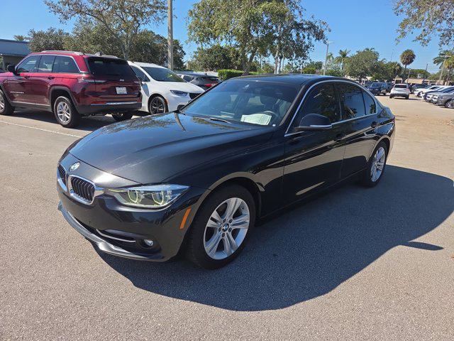 used 2018 BMW 330 car, priced at $13,267