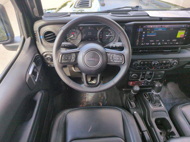 used 2024 Jeep Wrangler 4xe car, priced at $40,413