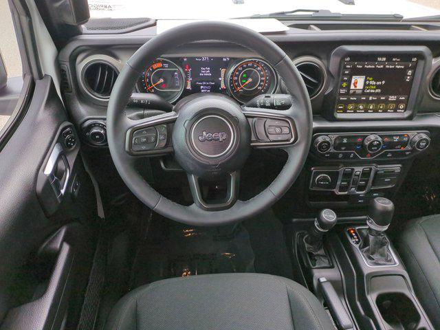 used 2023 Jeep Wrangler car, priced at $38,292