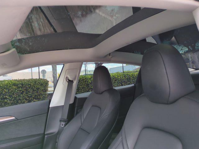 used 2023 Tesla Model 3 car, priced at $32,491