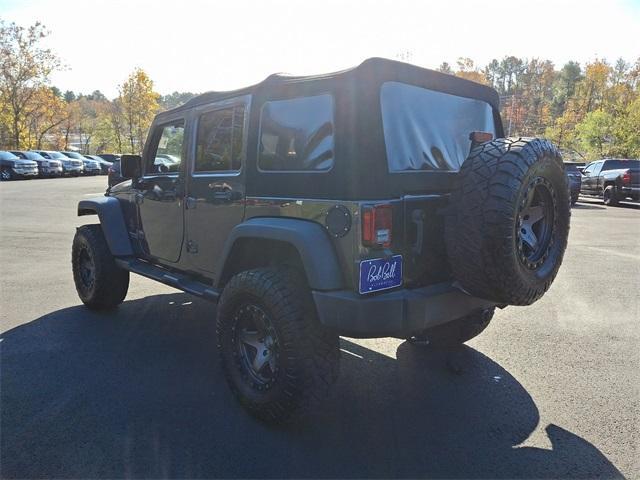 used 2016 Jeep Wrangler Unlimited car, priced at $19,529