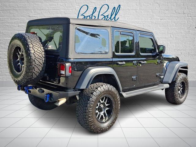 used 2021 Jeep Wrangler Unlimited car, priced at $27,313