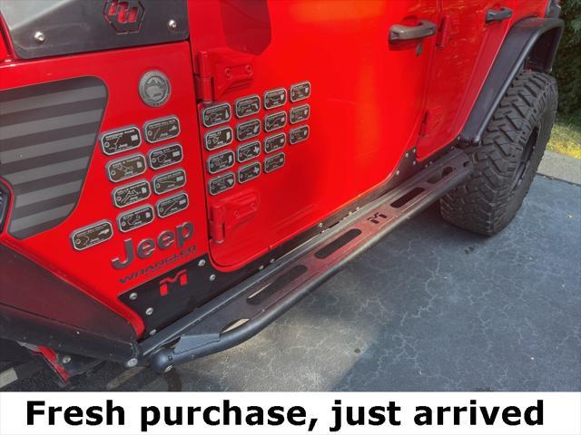 used 2021 Jeep Wrangler Unlimited car, priced at $42,990