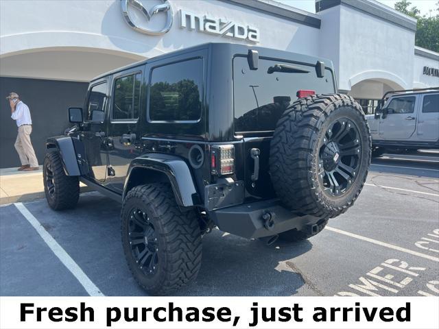 used 2015 Jeep Wrangler Unlimited car, priced at $29,990
