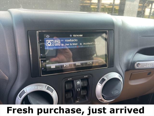 used 2015 Jeep Wrangler Unlimited car, priced at $29,990