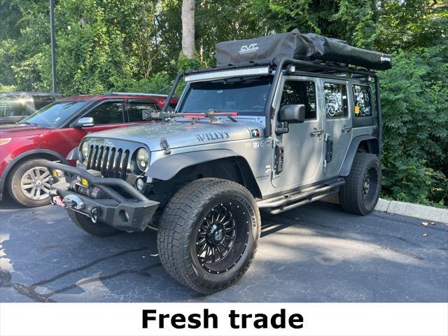 used 2015 Jeep Wrangler Unlimited car, priced at $16,990