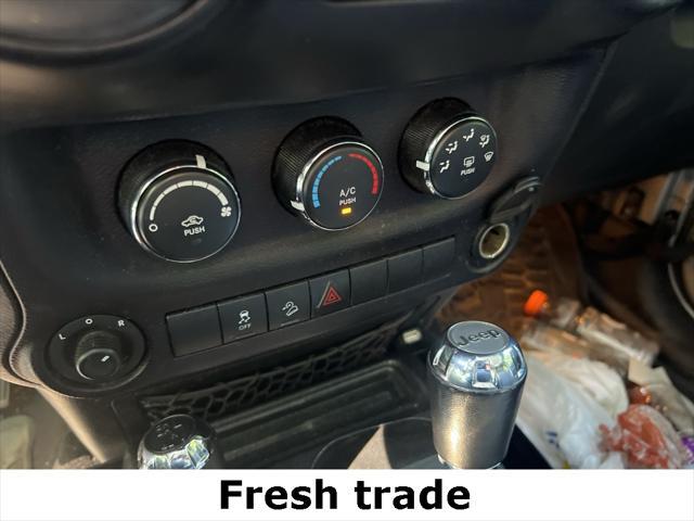 used 2015 Jeep Wrangler Unlimited car, priced at $16,990