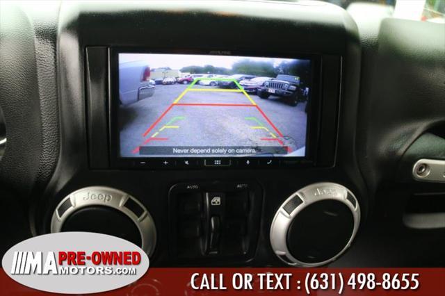 used 2013 Jeep Wrangler Unlimited car, priced at $13,495