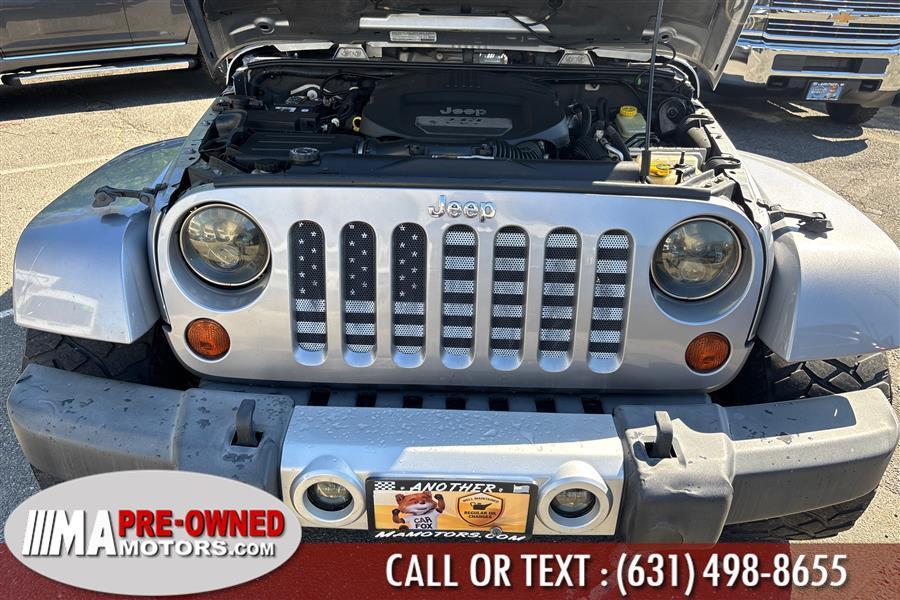used 2013 Jeep Wrangler Unlimited car, priced at $13,495