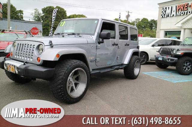 used 2013 Jeep Wrangler Unlimited car, priced at $13,495