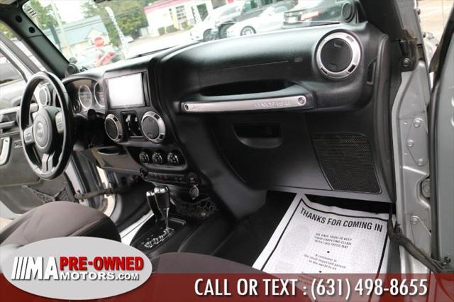 used 2013 Jeep Wrangler Unlimited car, priced at $13,495