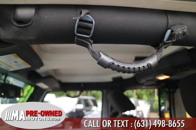 used 2013 Jeep Wrangler Unlimited car, priced at $13,495