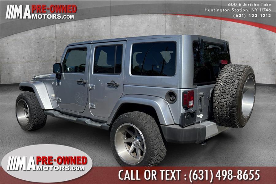 used 2013 Jeep Wrangler Unlimited car, priced at $13,495
