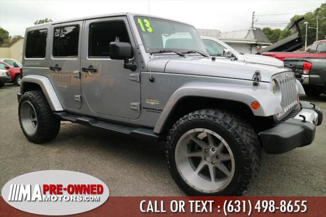 used 2013 Jeep Wrangler Unlimited car, priced at $13,495