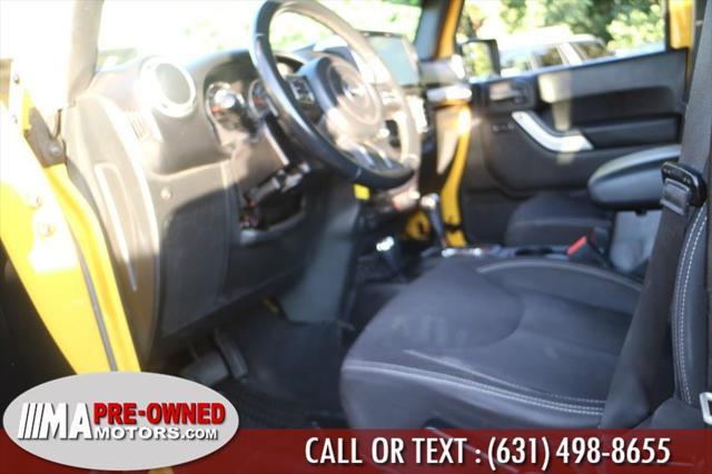 used 2015 Jeep Wrangler Unlimited car, priced at $26,495
