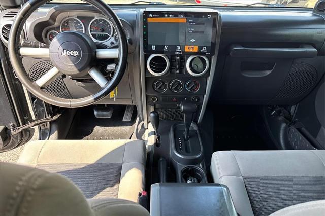 used 2010 Jeep Wrangler Unlimited car, priced at $9,995