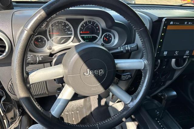 used 2010 Jeep Wrangler Unlimited car, priced at $9,995