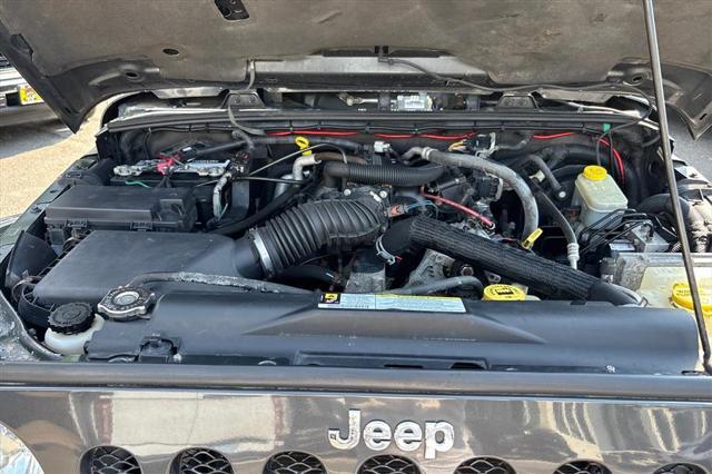 used 2010 Jeep Wrangler Unlimited car, priced at $9,995