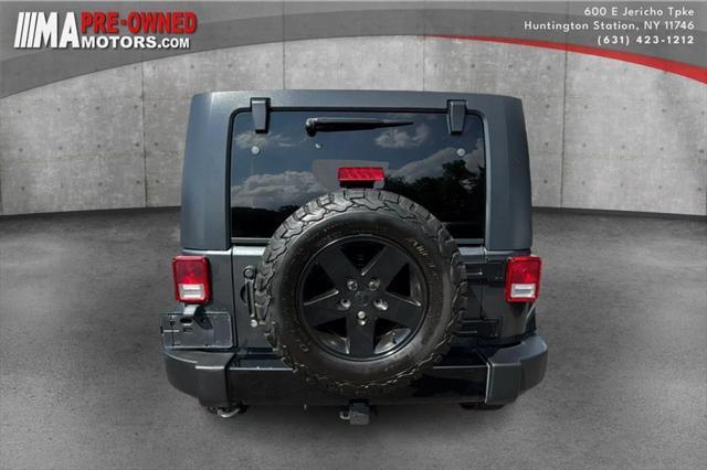 used 2010 Jeep Wrangler Unlimited car, priced at $9,995