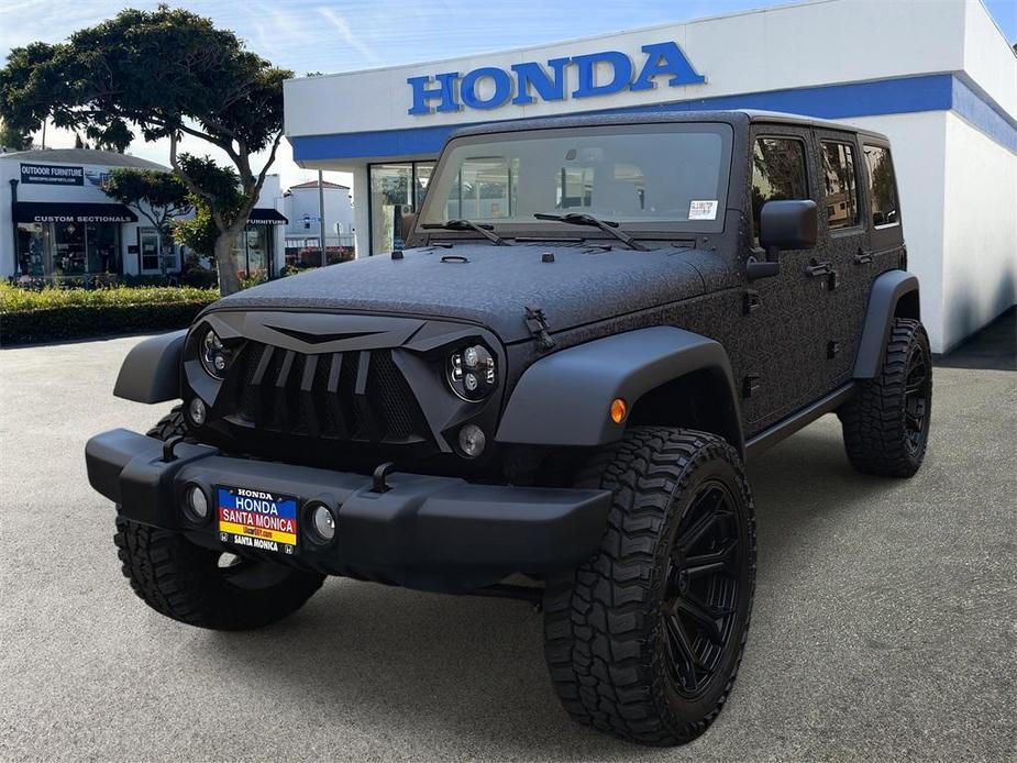 used 2016 Jeep Wrangler Unlimited car, priced at $35,498