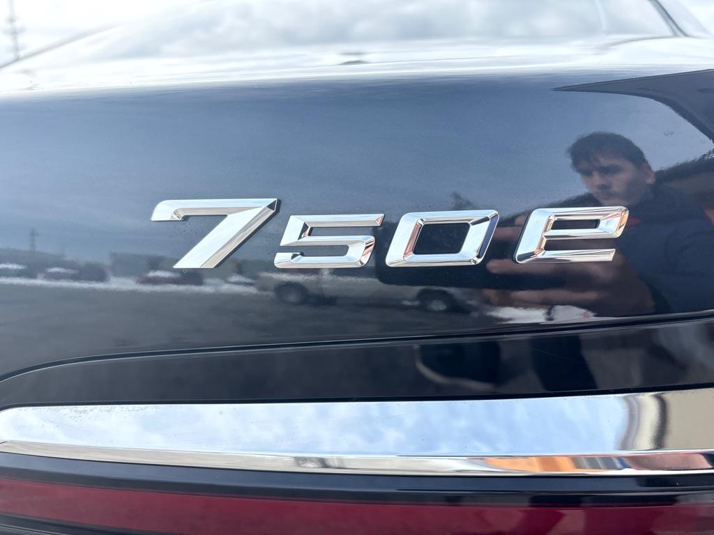 used 2024 BMW 750e car, priced at $89,850