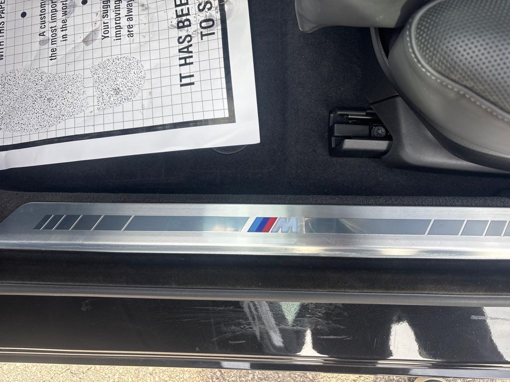 used 2024 BMW 750e car, priced at $89,850