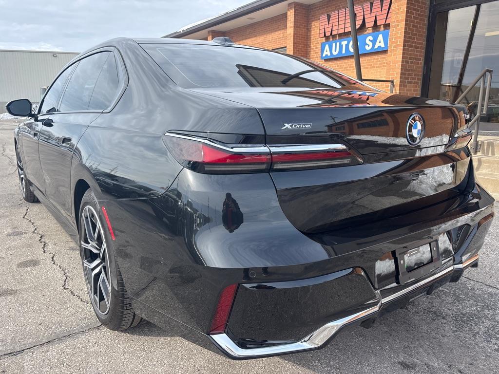 used 2024 BMW 750e car, priced at $89,850