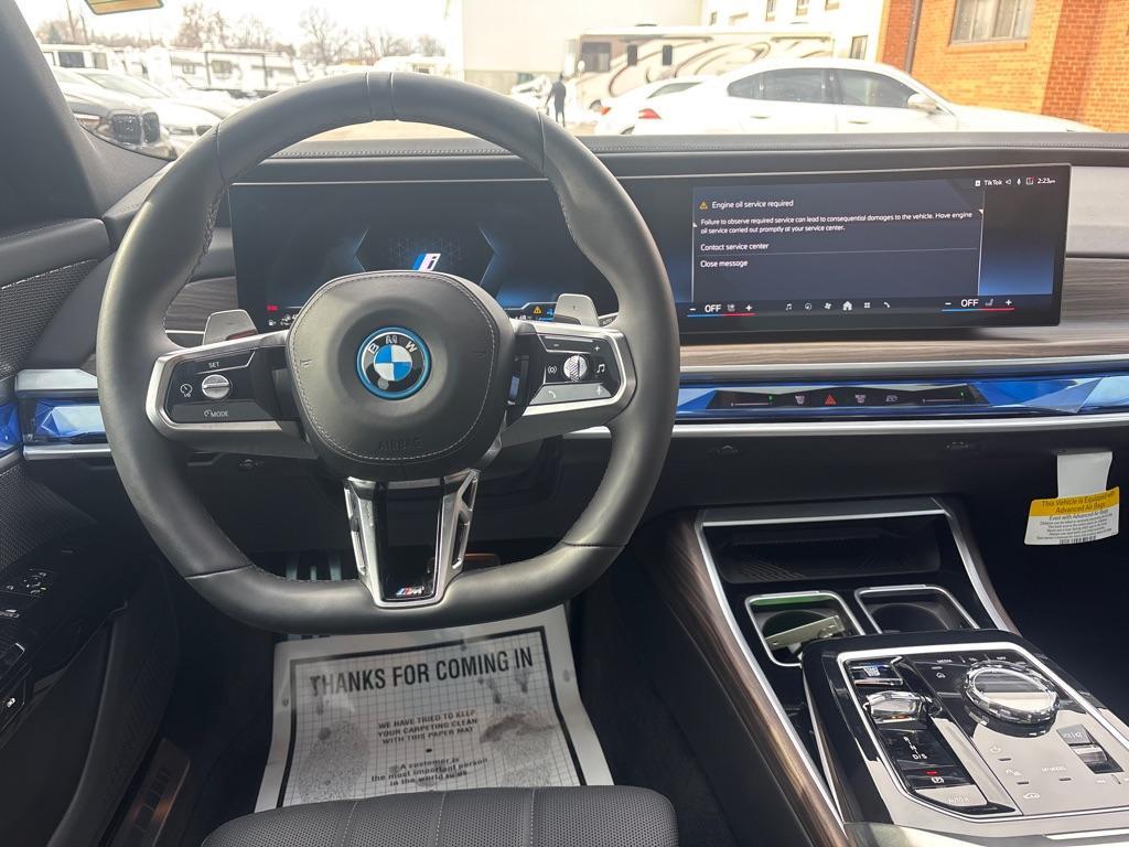 used 2024 BMW 750e car, priced at $89,850