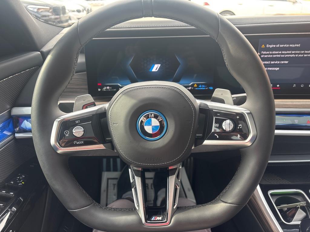 used 2024 BMW 750e car, priced at $89,850