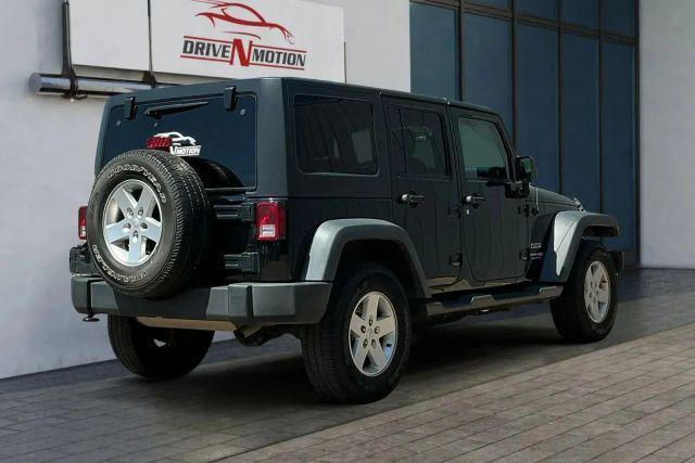 used 2018 Jeep Wrangler JK Unlimited car, priced at $20,971