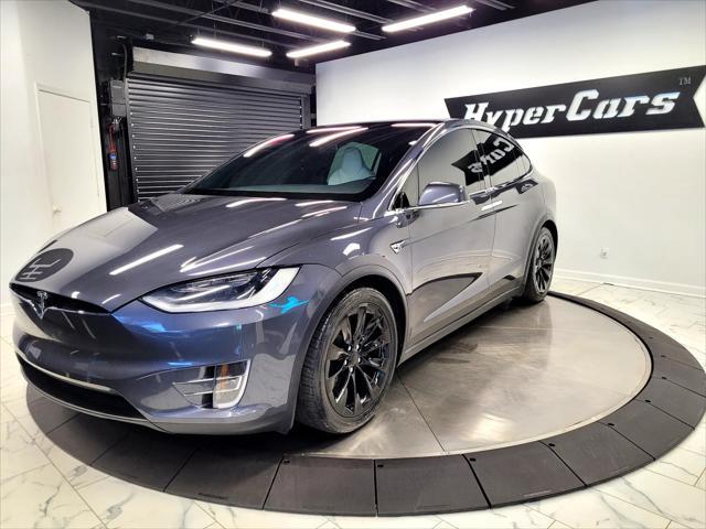used 2018 Tesla Model X car, priced at $28,590