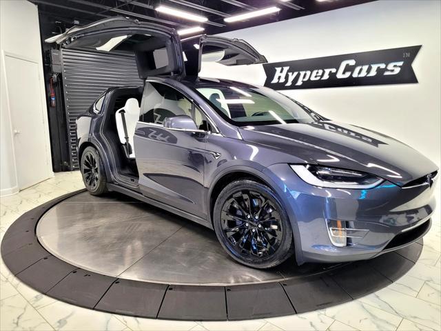 used 2018 Tesla Model X car, priced at $28,590