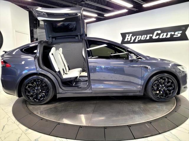 used 2018 Tesla Model X car, priced at $27,590