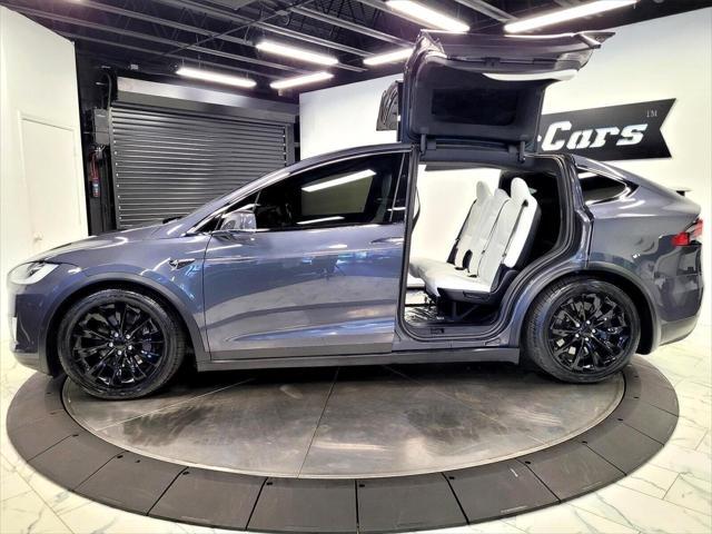 used 2018 Tesla Model X car, priced at $27,590