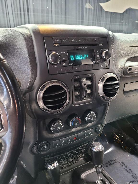 used 2018 Jeep Wrangler JK Unlimited car, priced at $26,990