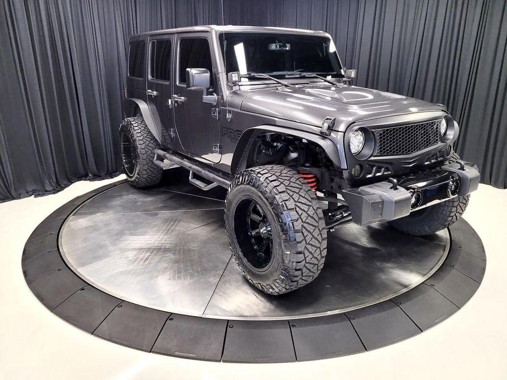 used 2018 Jeep Wrangler JK Unlimited car, priced at $26,990