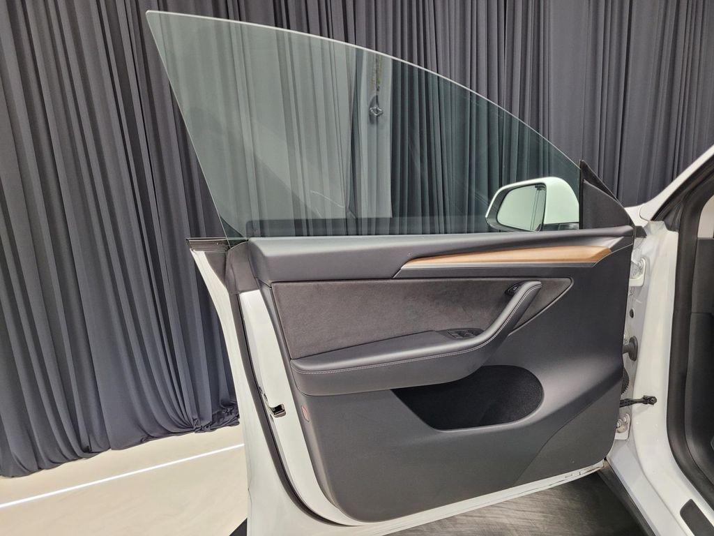 used 2023 Tesla Model Y car, priced at $30,990