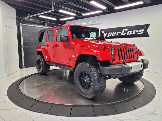 used 2014 Jeep Wrangler Unlimited car, priced at $22,998