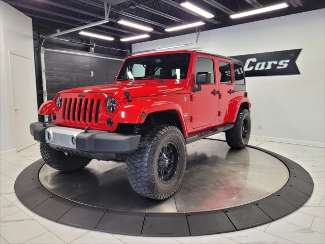 used 2014 Jeep Wrangler Unlimited car, priced at $22,998