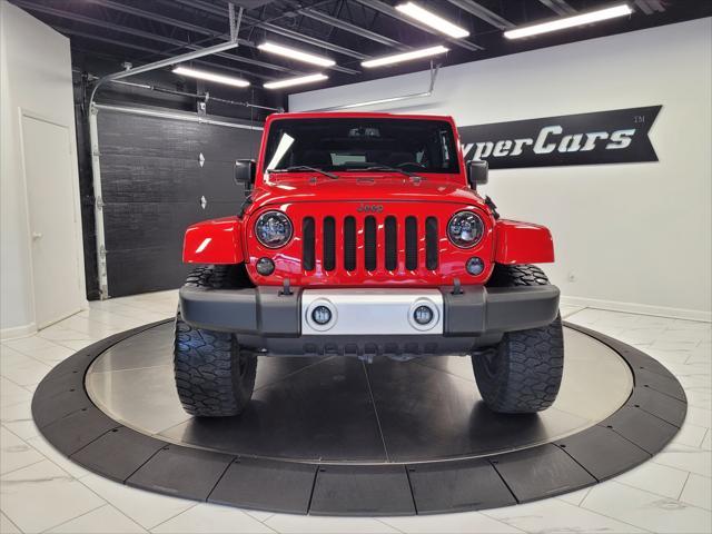 used 2014 Jeep Wrangler Unlimited car, priced at $22,998