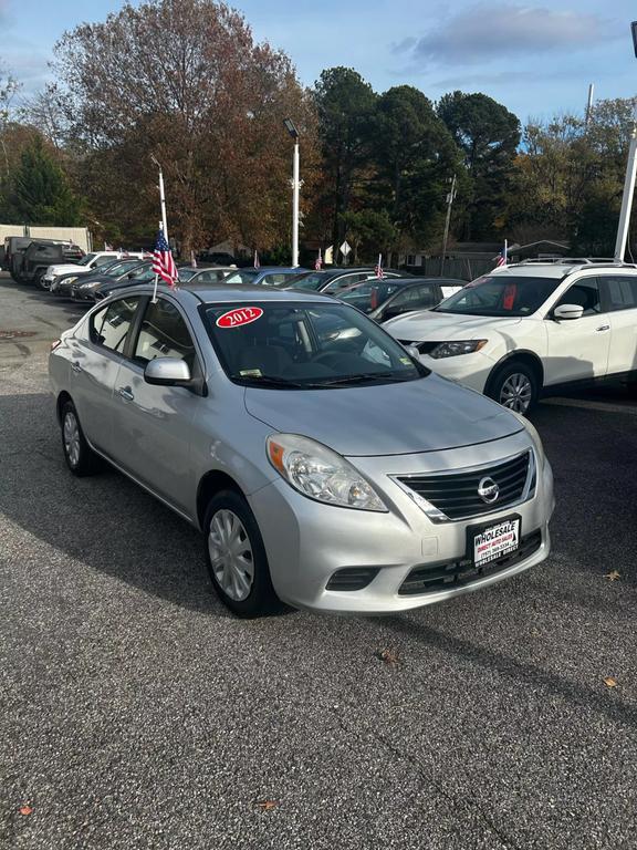 used 2012 Nissan Versa car, priced at $6,500