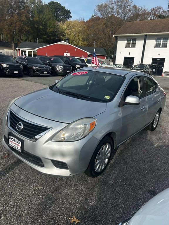 used 2012 Nissan Versa car, priced at $6,500