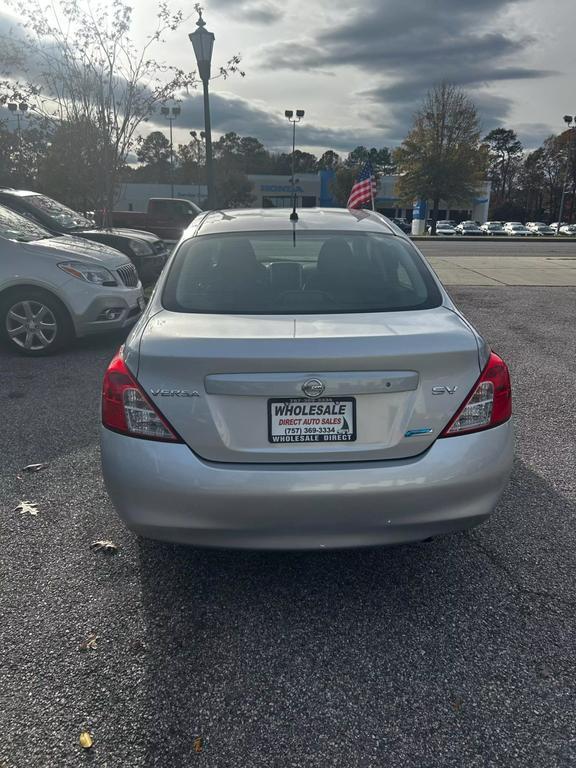 used 2012 Nissan Versa car, priced at $6,500