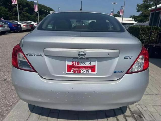 used 2012 Nissan Versa car, priced at $6,999