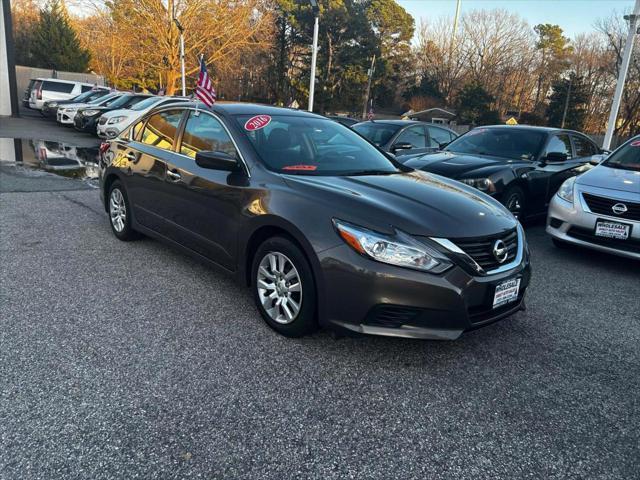 used 2016 Nissan Altima car, priced at $9,999