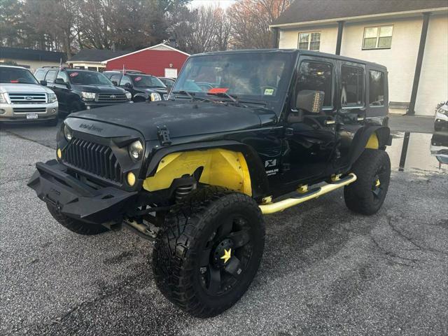 used 2009 Jeep Wrangler Unlimited car, priced at $10,500