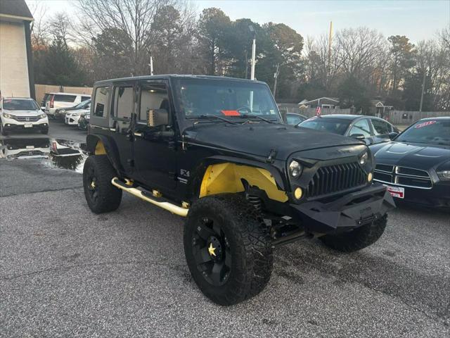 used 2009 Jeep Wrangler Unlimited car, priced at $10,500