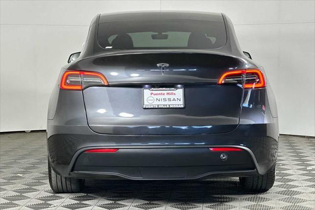 used 2024 Tesla Model Y car, priced at $37,764