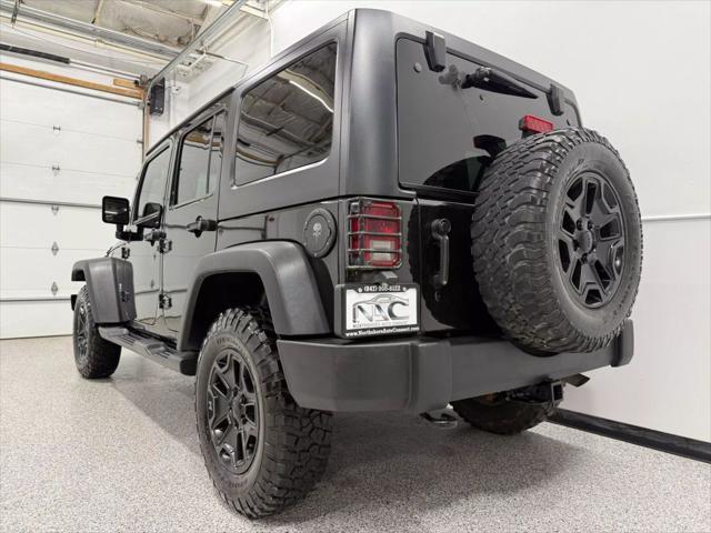 used 2014 Jeep Wrangler Unlimited car, priced at $18,595